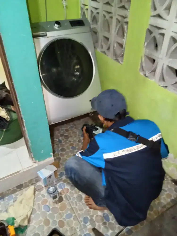 Service mesin cuci