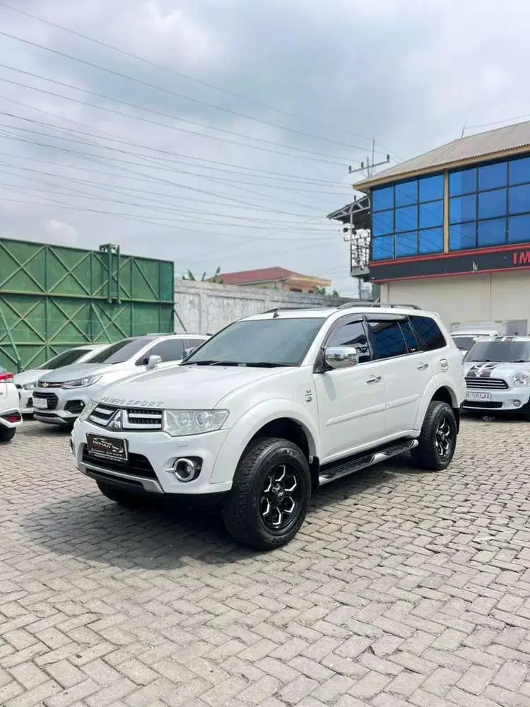 Mitsubishi Pajero Sport Dakar VGT A/TPutih 2013 fortuner 2014 vnt 2015