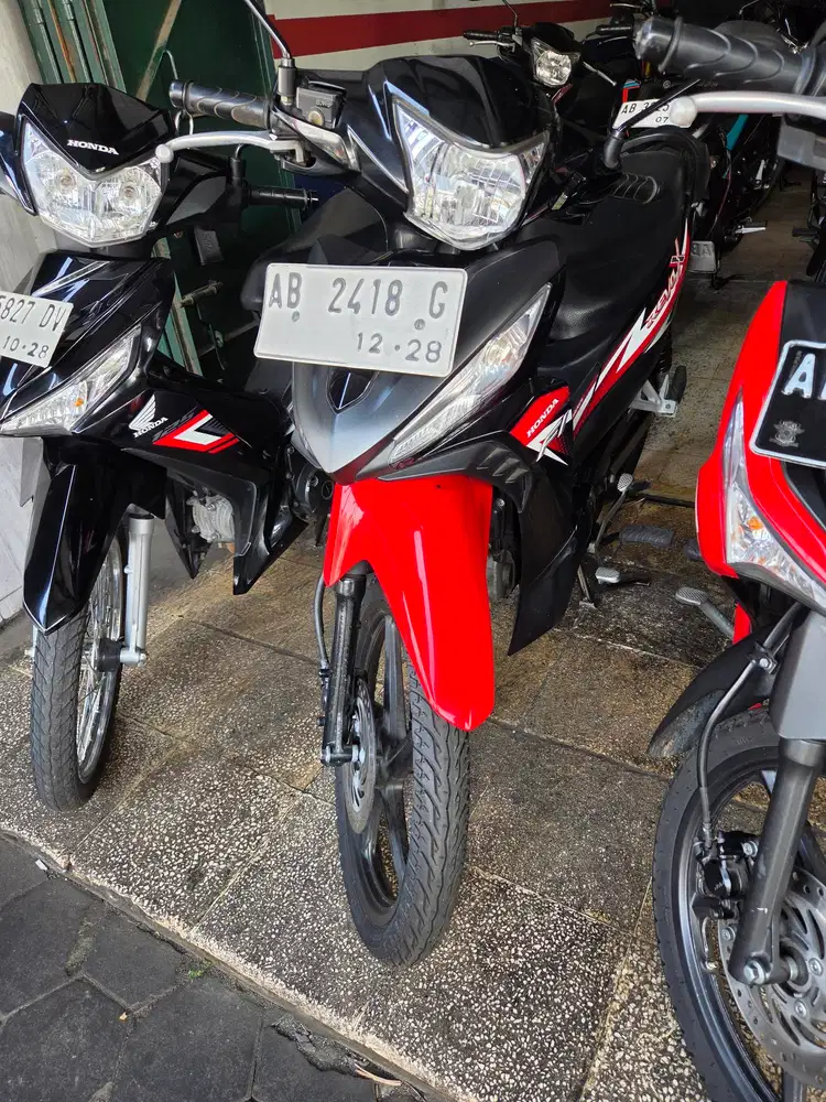 Revo x hitam merah 2023 Gbm