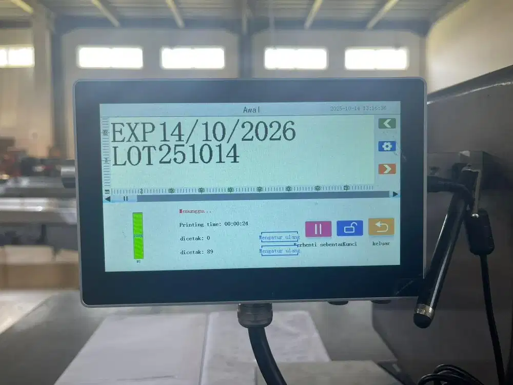 Mesin cetak expired date otomatis
