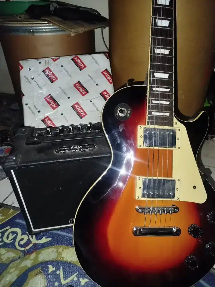 Guitar Gibson less paul + ampli dll