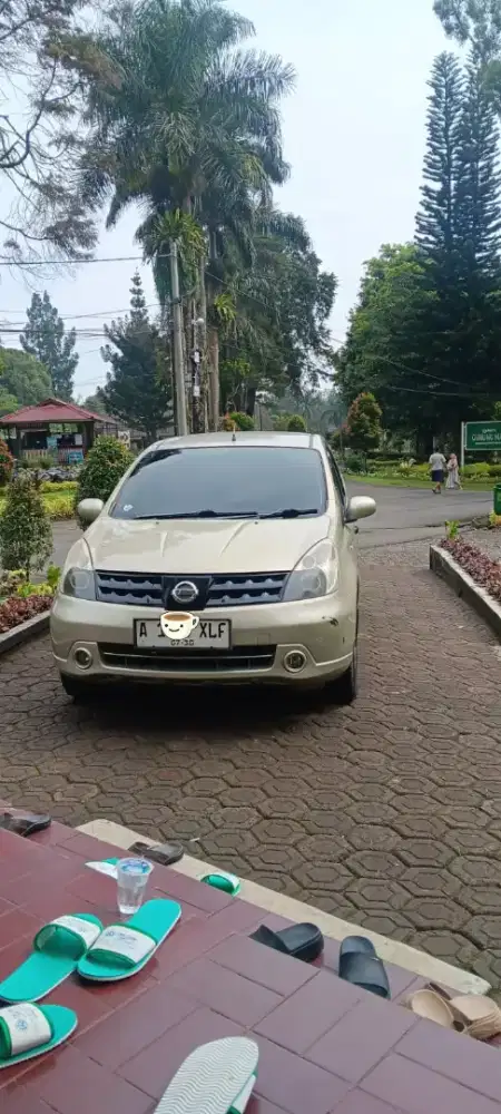 Nisan Grandlivina 2007 manual SV coklat