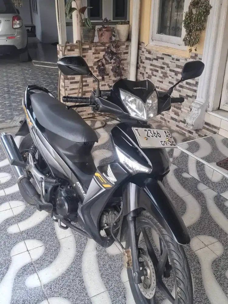 Honda Supra X 125 pgm fi