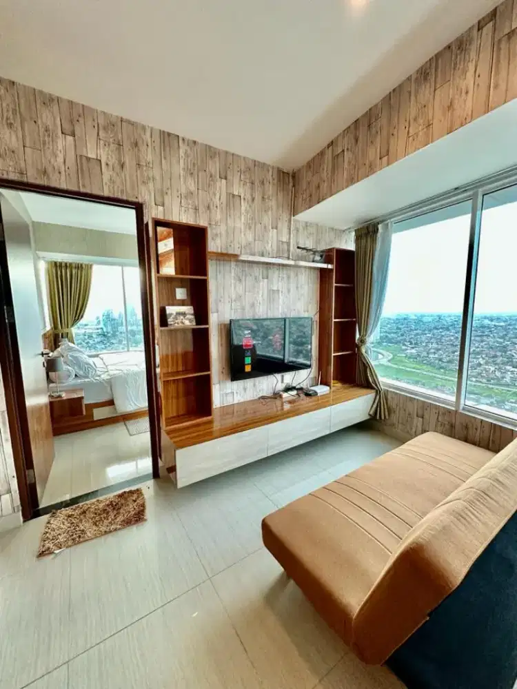 Sewa apartemen grand kamala lagoon