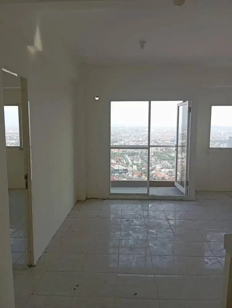 DIJUAL APARTEMEN PUNCAK DHARMAHUSADA MURAH SIAP HUNI