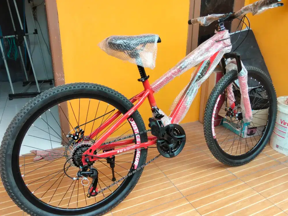 Sepeda gunung justice league MN 571 warna merah