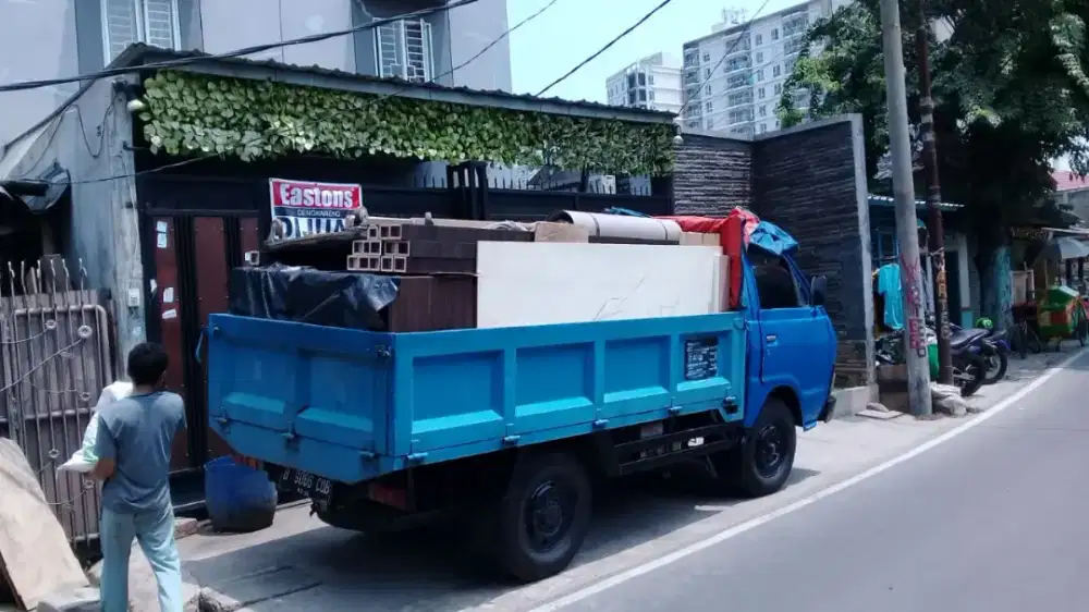 Melayani jasa pindahan rumah pakai mobil engkel bak