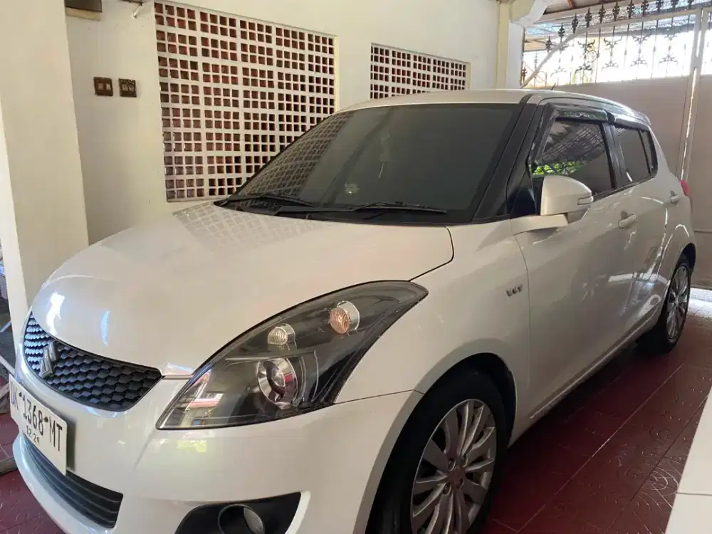 Jual mobil bekas Suzuki Switf 2016, matic, warna putih metalic