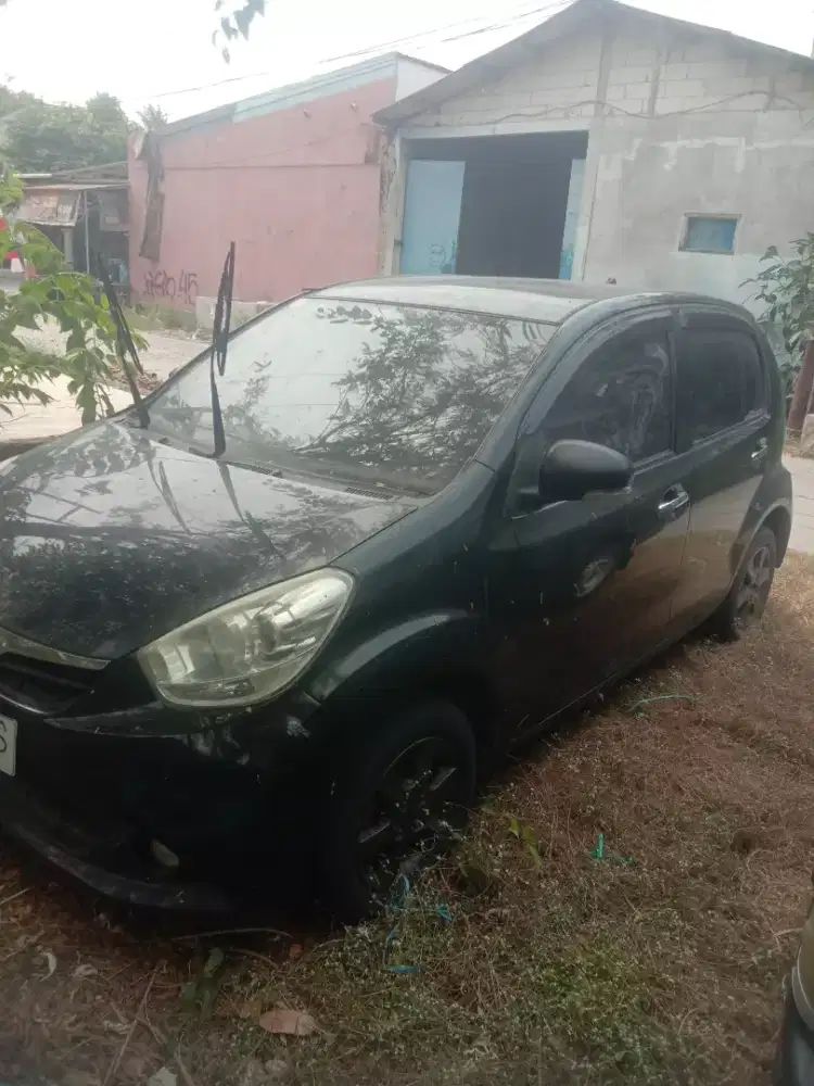 Daihatsu sirion tahun 2013 individu manual bensin