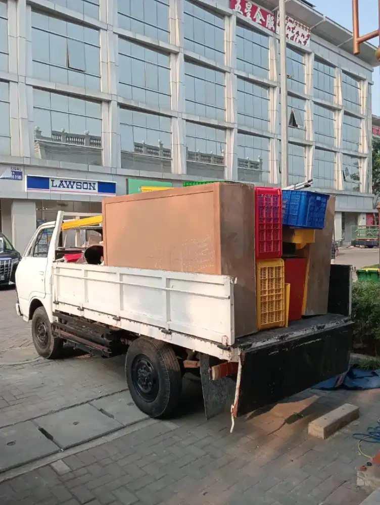 Jasa pindahan rumah menggunakan mobil engkel bak