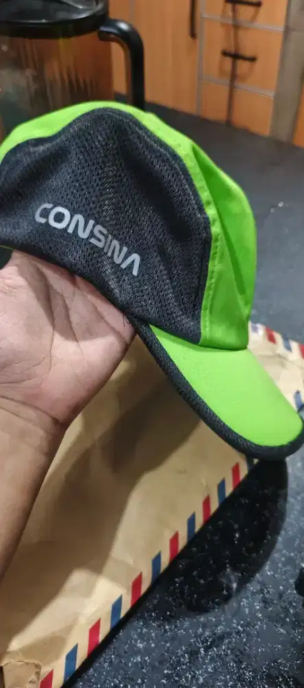 Topi merk consina ori