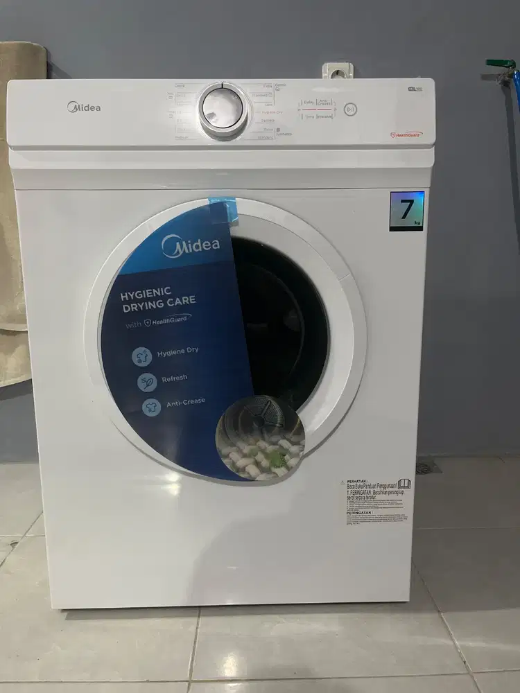 Pengering pakaian Midea MD100A70