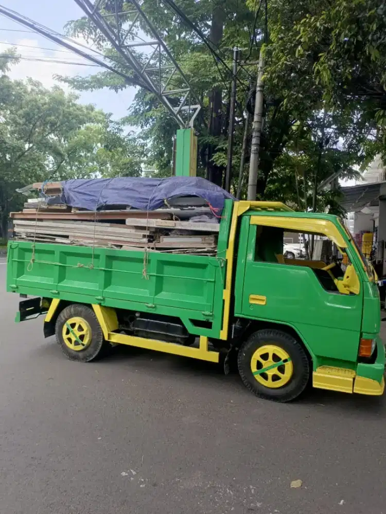 Angkut puing bangunan rumah