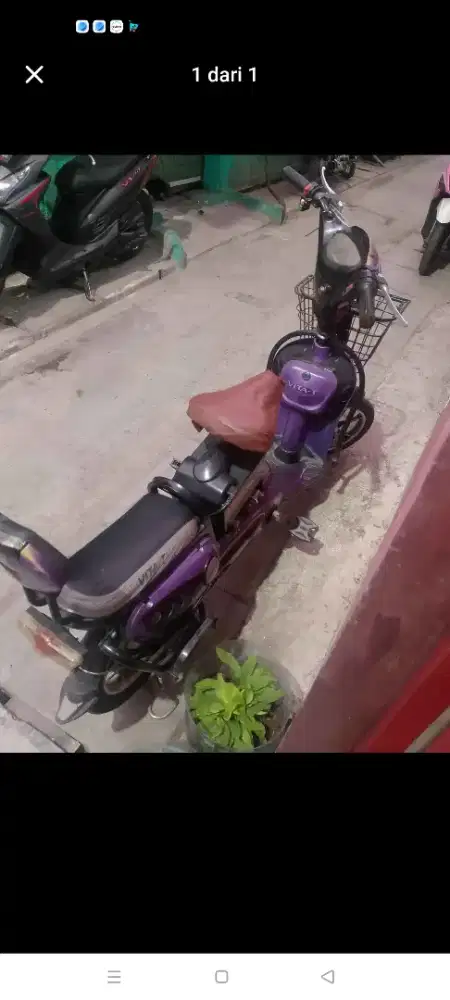 Sepeda Listrik Ungu