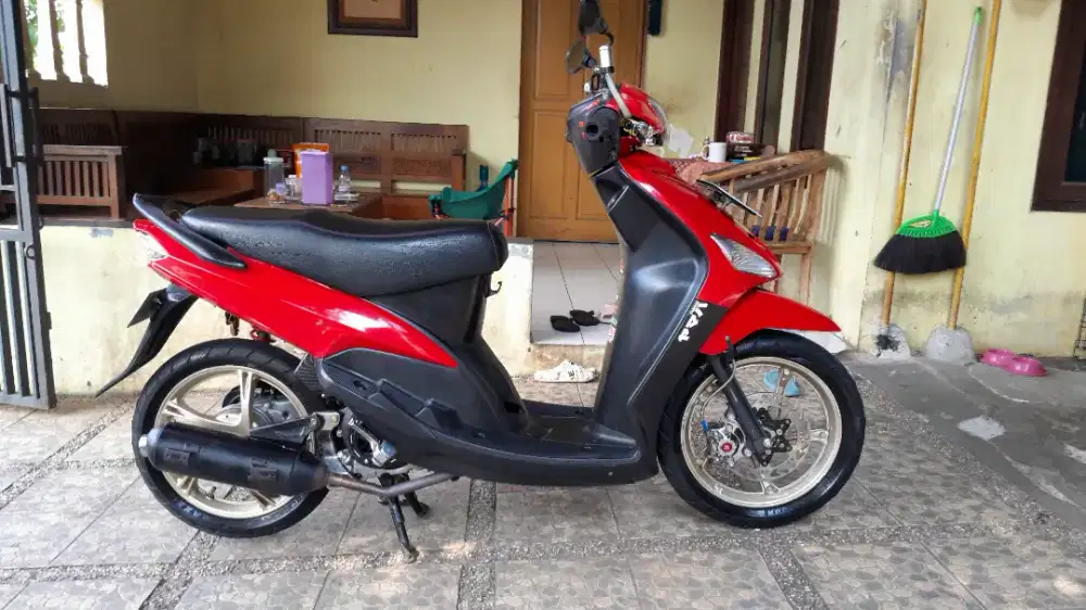Mio Sporty 5tl merah
