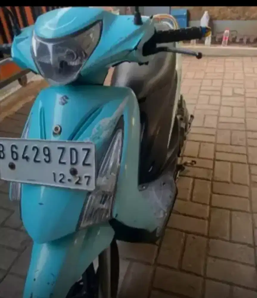 Suzuki spin surat lengkap