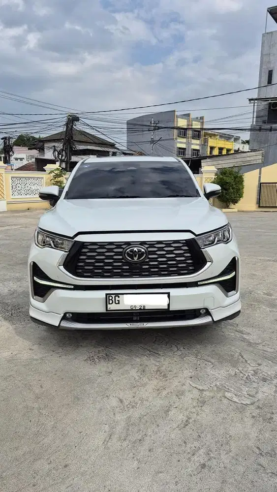 Innova Zenix Q HV CVT TTS Modellista Hybrid AT