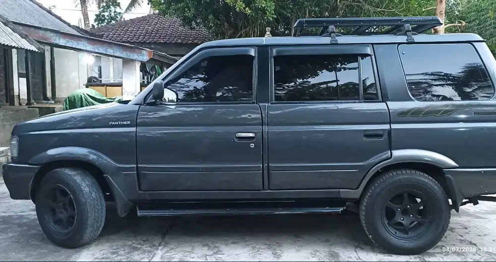 Isuzu Panther New Higrade tahun 2000.