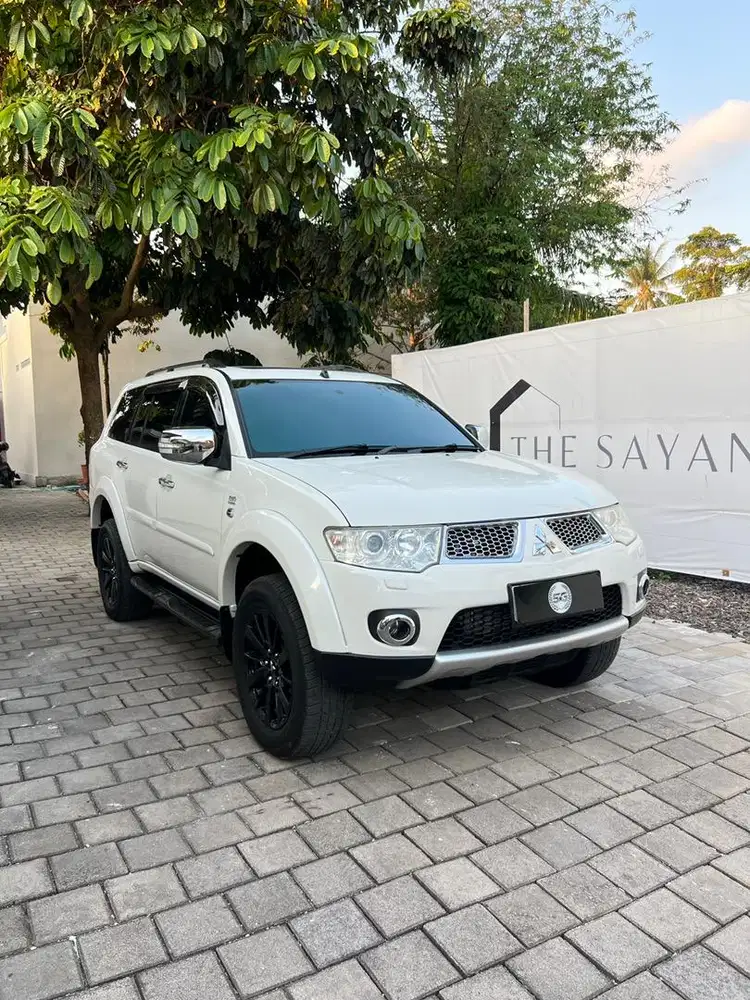 MITSUBISHI PAJERO SPORT DAKAR 4x4 2014 PMK DIESEL AT PUTIH
