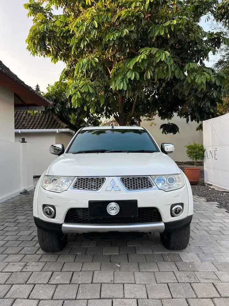 MITSUBISHI PAJERO SPORT DAKAR 4x4 2014 PMK DIESEL AT PUTIH