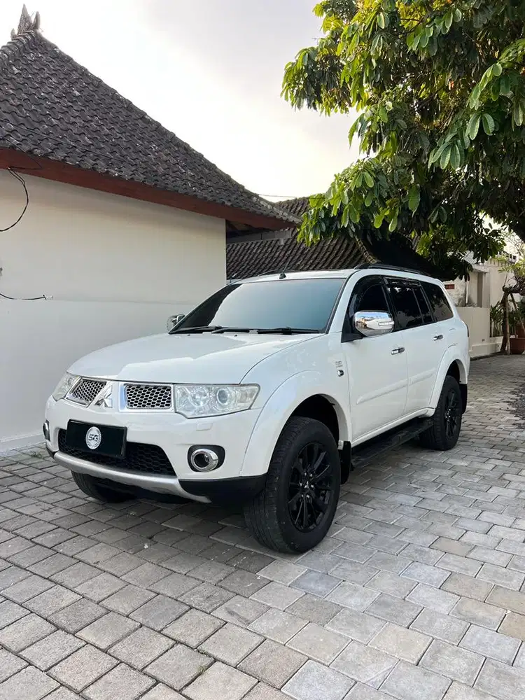 MITSUBISHI PAJERO SPORT DAKAR 4x4 2014 PMK DIESEL AT PUTIH