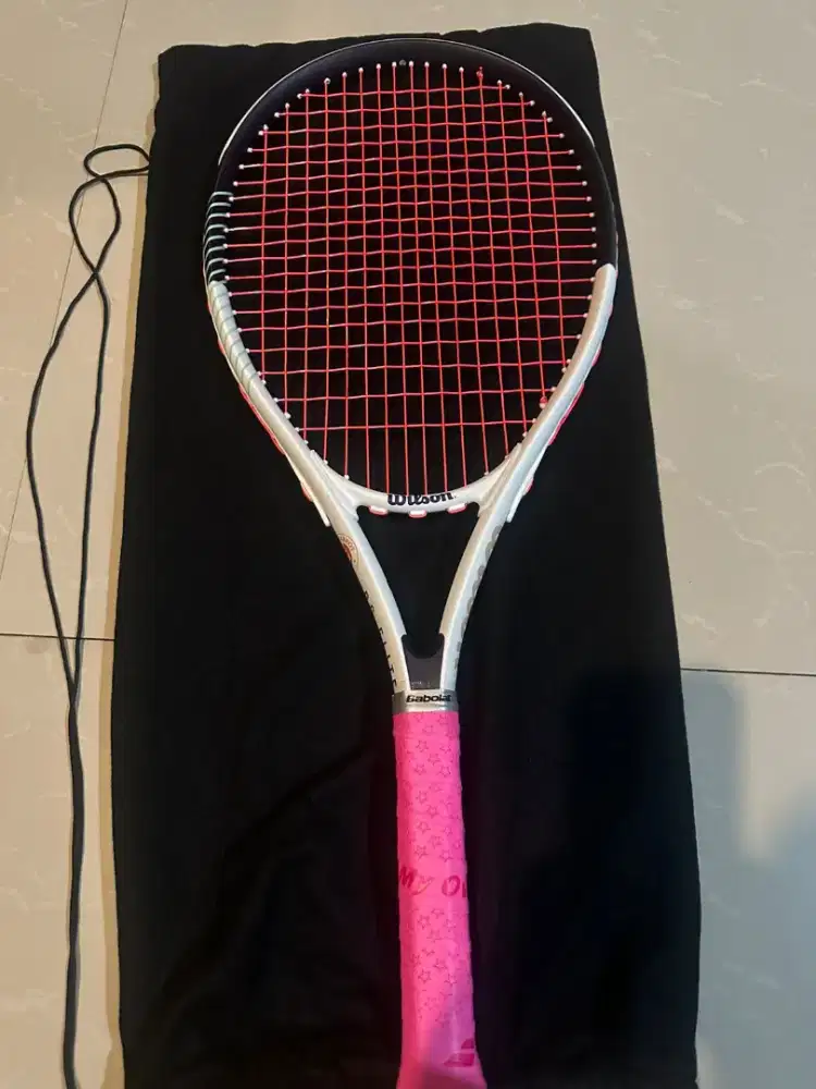Raket tenis merk Wilson