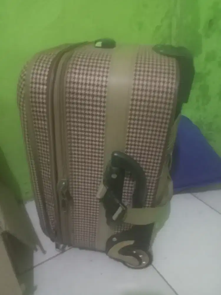 Koper sama jas hujan