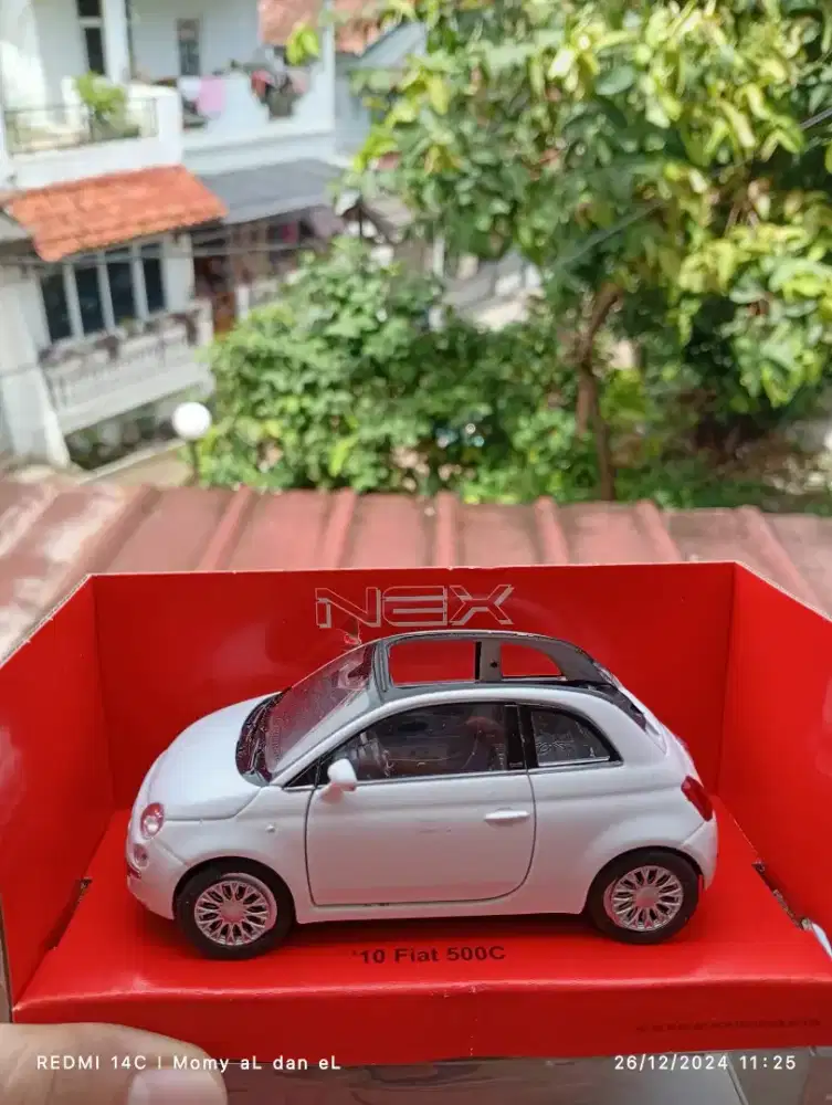 Mobil besi next