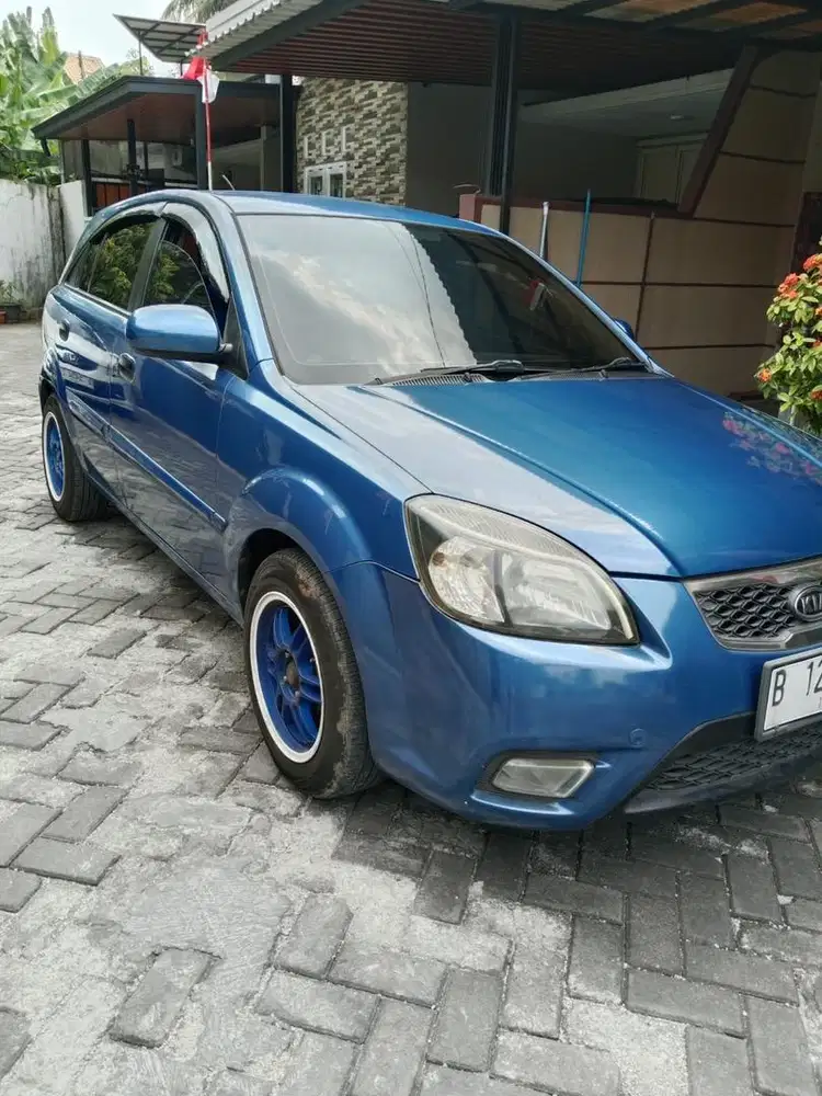 Kia Pride 2011 kondisi terawat KM rendah