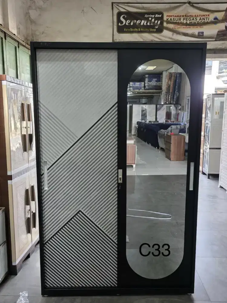 Lemari 2 pintu bhan plat besi ukuran ( P 120 L 43 T 185 cm)