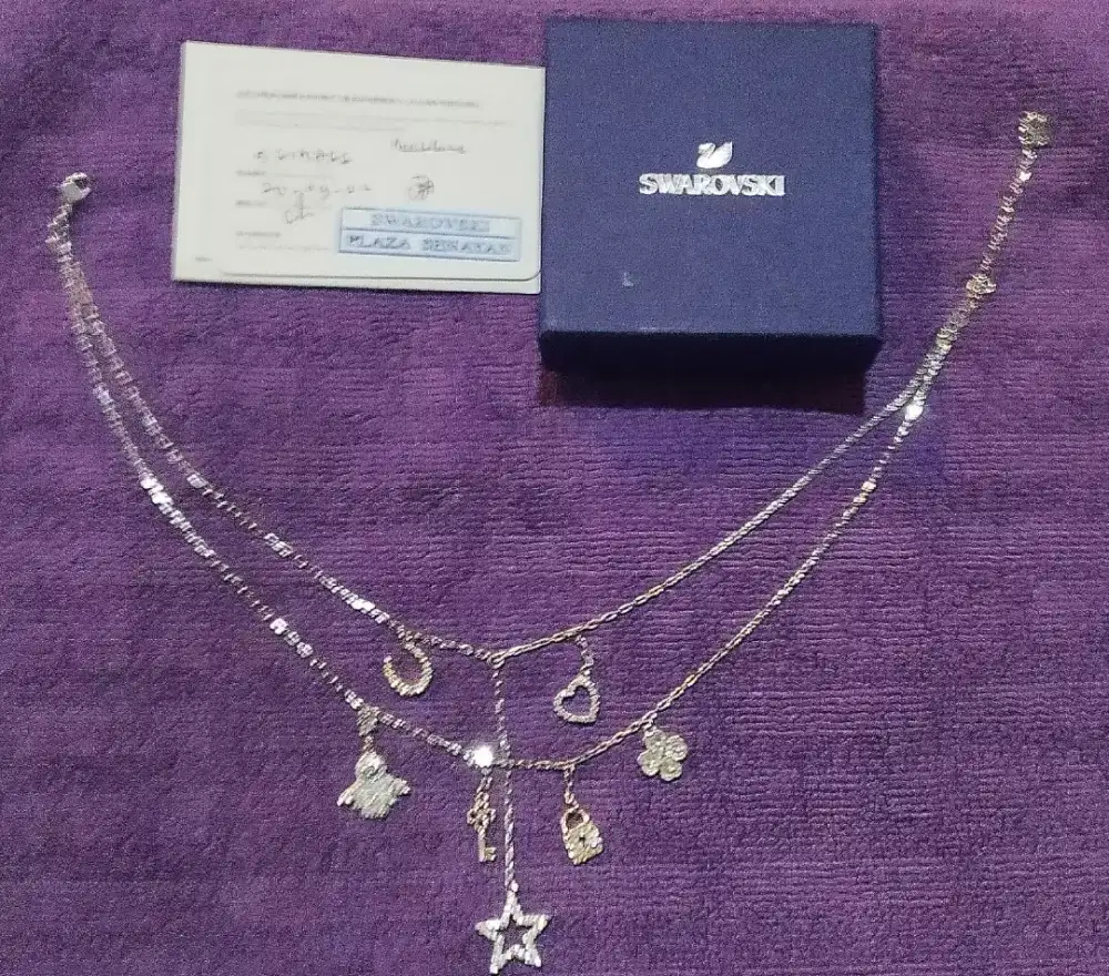Authentic Swarovski multi charm with  box  & stamp  Auth store