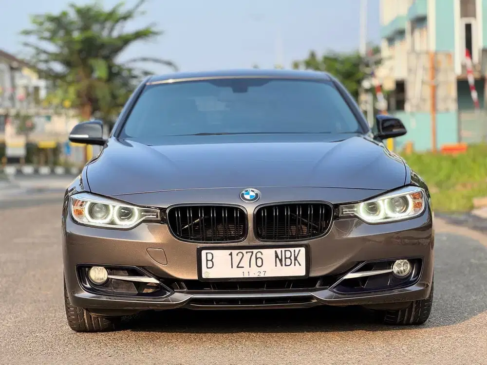 BMW 320i Sport AT 2014 Coklat metalik (Aha Gallery)