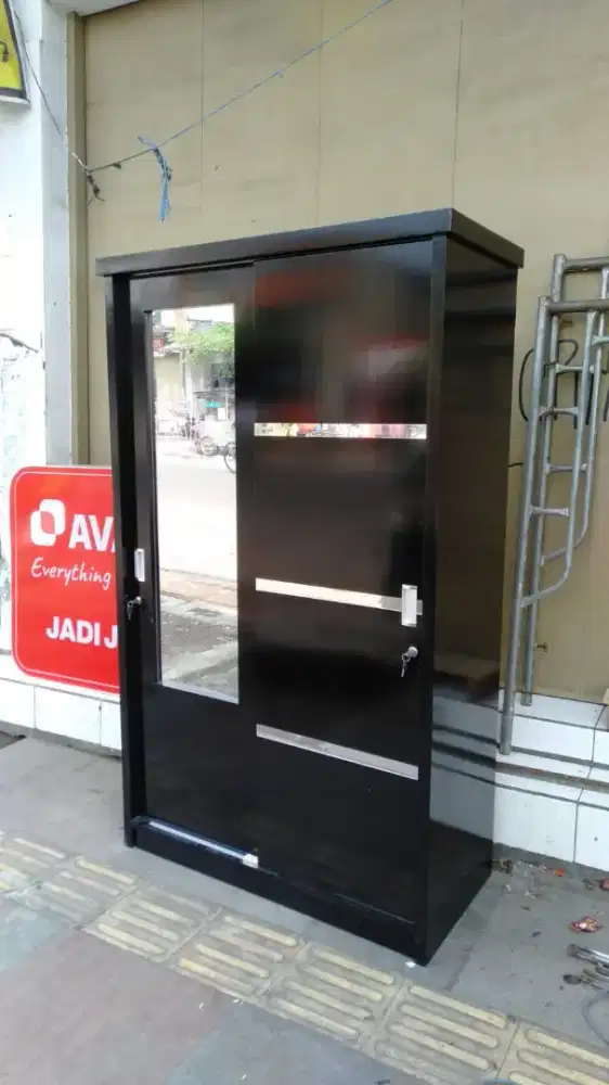 Lemari 2 pintu bhan trikblok ukran ( P 120 L 50 T 200 cm )