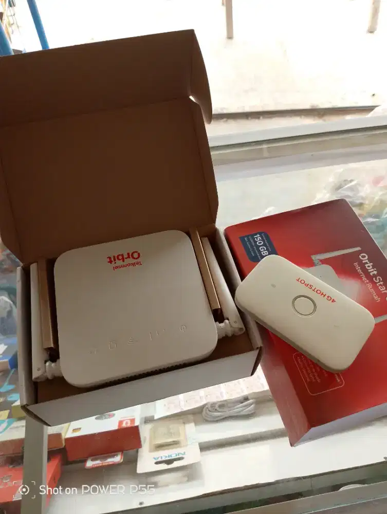 Modem orbit Tsel G1 dan modem saku