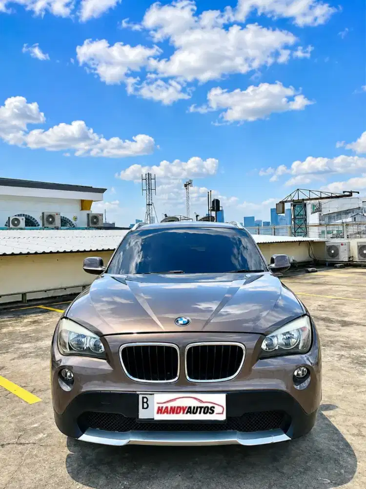 BMW X1 Executive 2011 Automatic Coklat