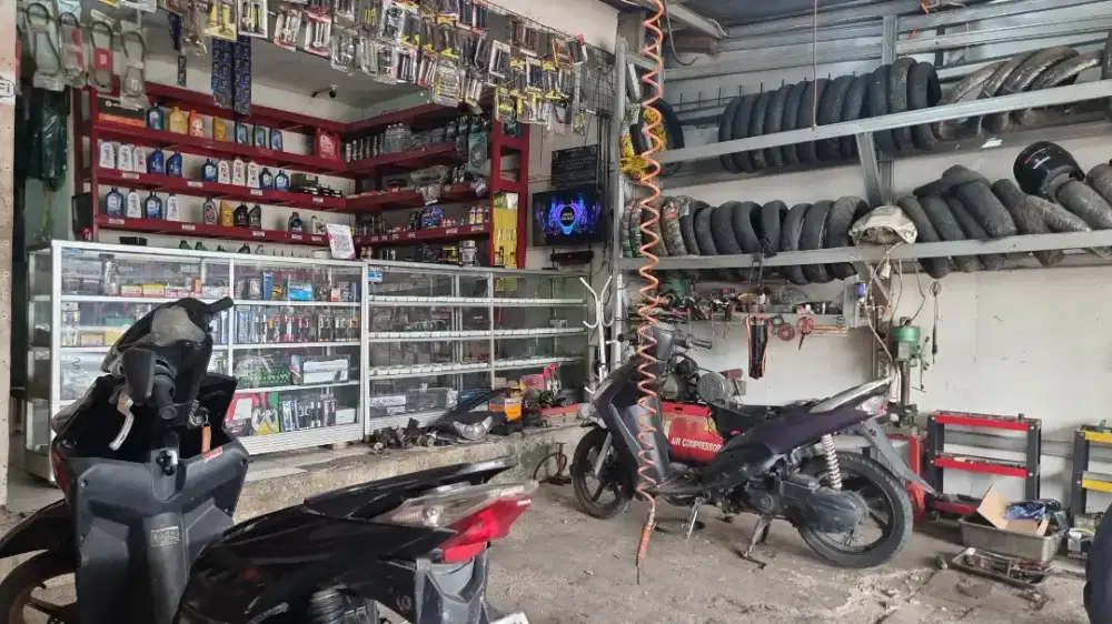 Over kontrak bengkel motor