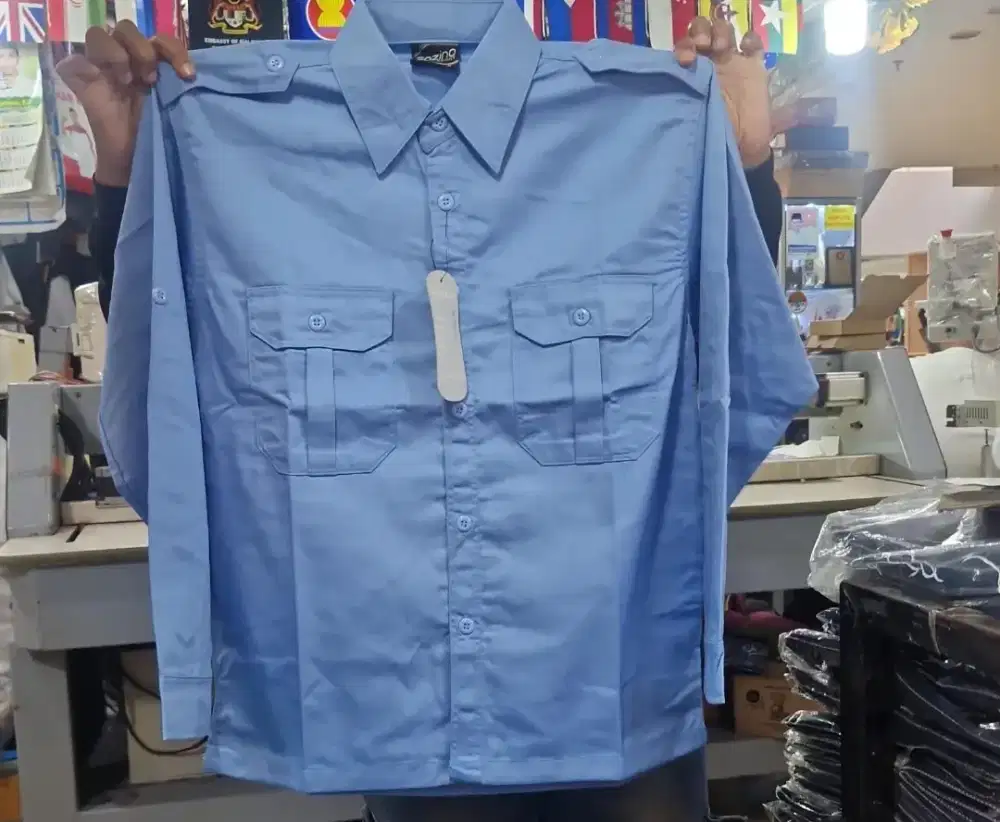 Baju kemeja lengan panjang biru muda  bahan dril