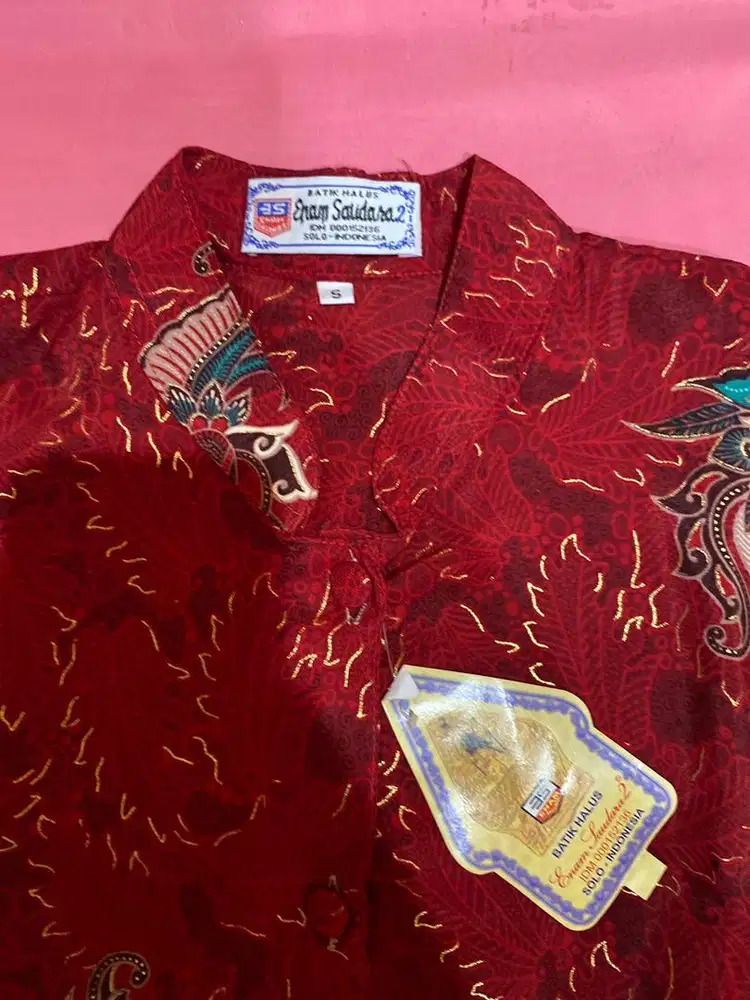 BAJU OLAHRAGA LAKI2 MERK UNIQLO