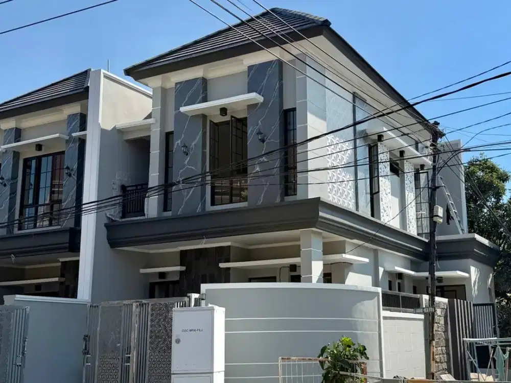 Rumah Baru Hoek American Classic 2 lantai di Babatan Pantai Surabaya