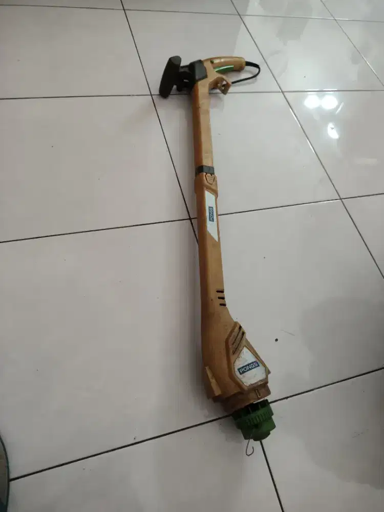 Alat pemotong rumput simple
