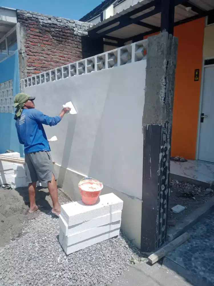 Tukang pagar tembok