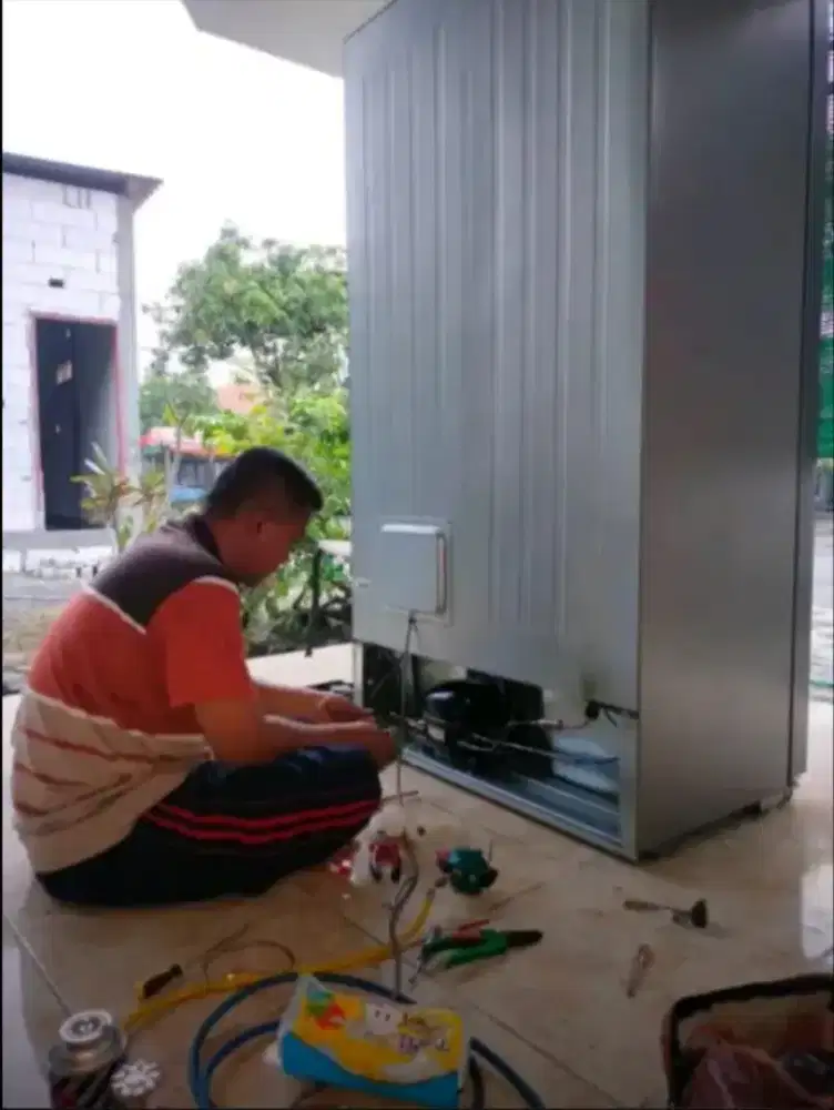 Jasa servis AC kulkas mesin cuci pompa air bongkar pasang AC dll