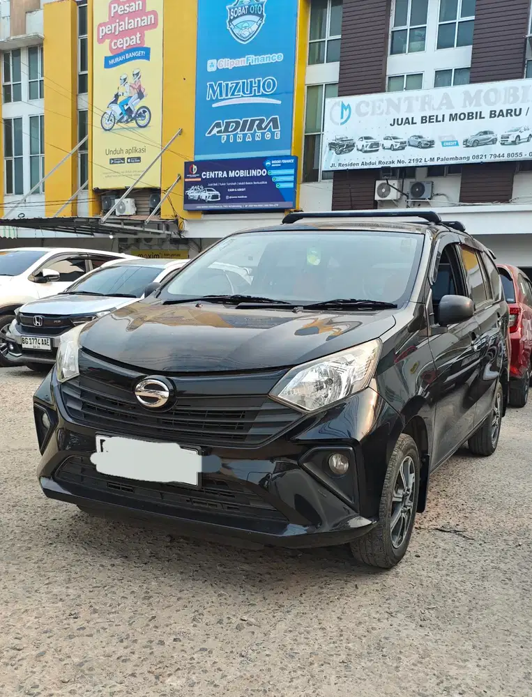 Sigra D 1.0 MT 2021 hitam istimewa dp 18 jt