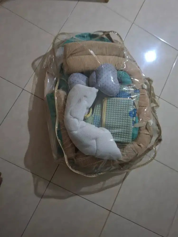 Tempat tidur bayi nest