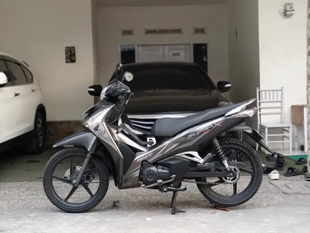 Supra x 125 helm in tahun 2013 full original/tt boleh cash lebih bagus