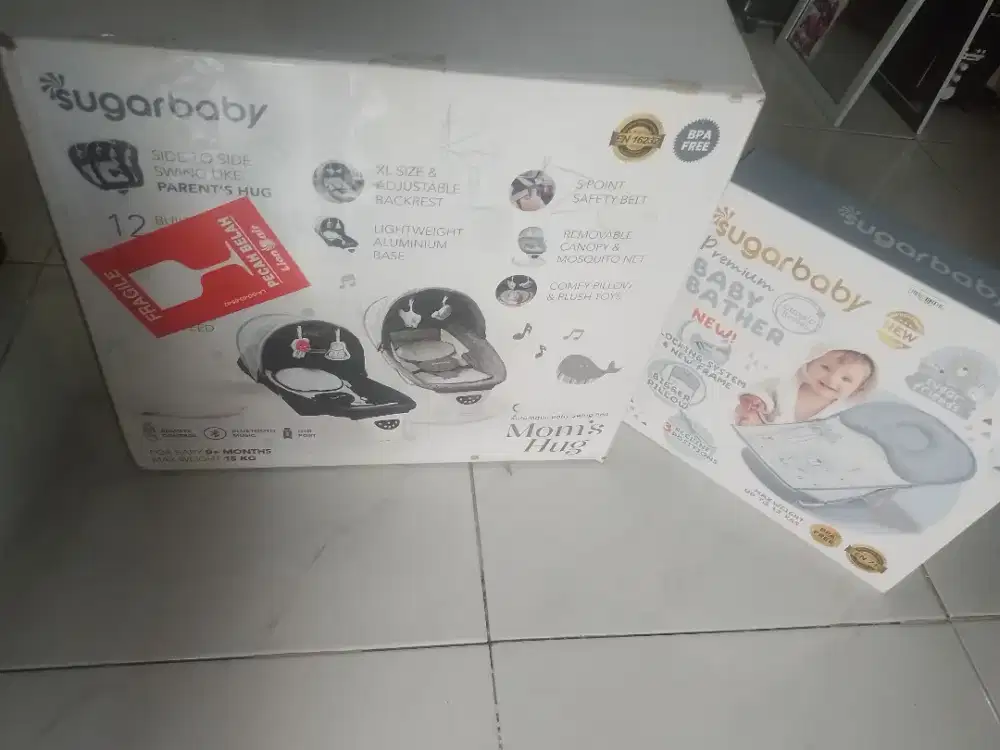 Tempat tidur goyang bayi