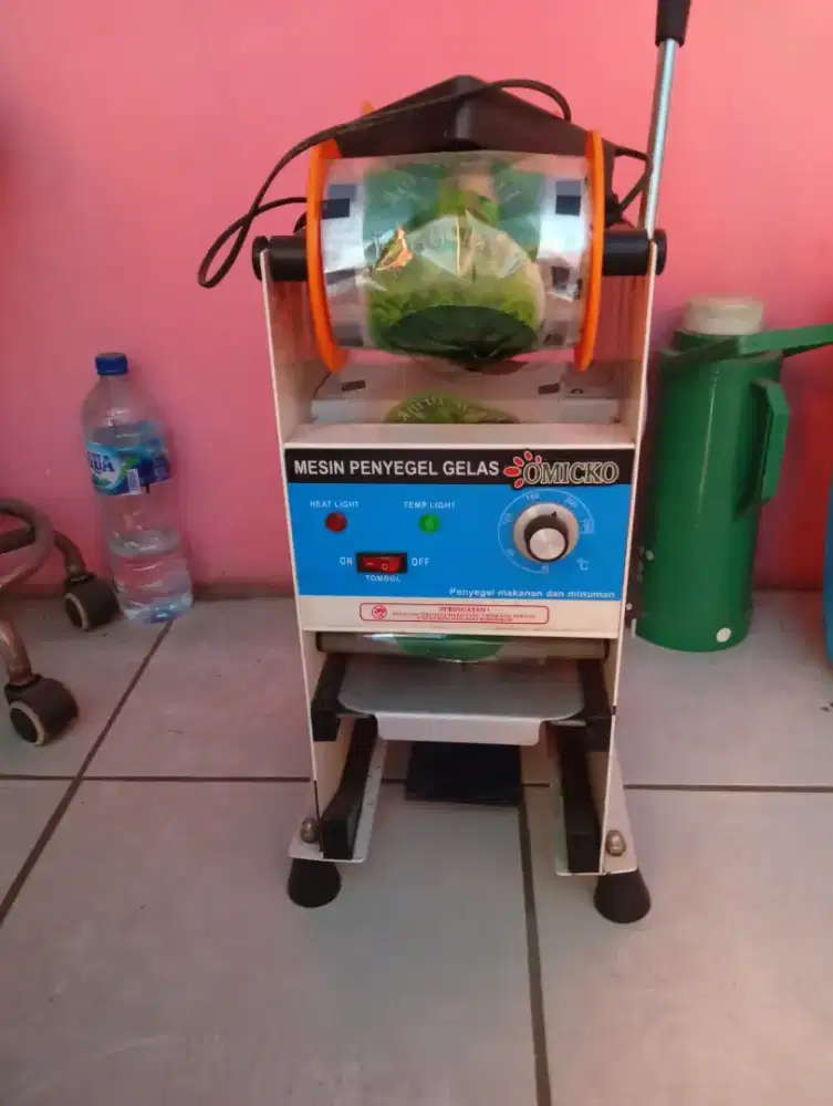 Mesin press untuk es teh jumbo dll