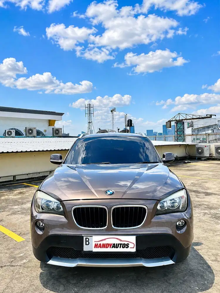 BMW X1 Executive 2011 Automatic Coklat Metalik