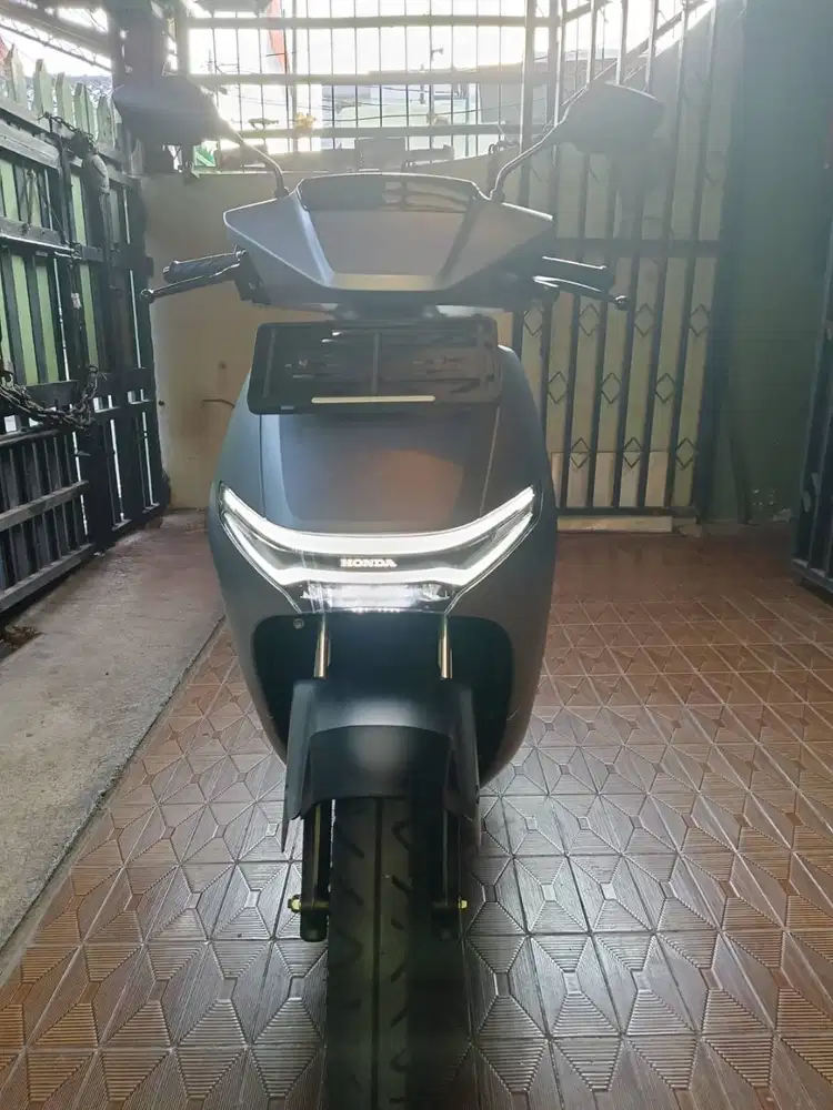 Motor Listrik Honda CUV Warna Silver Plat B Jakarta Timur