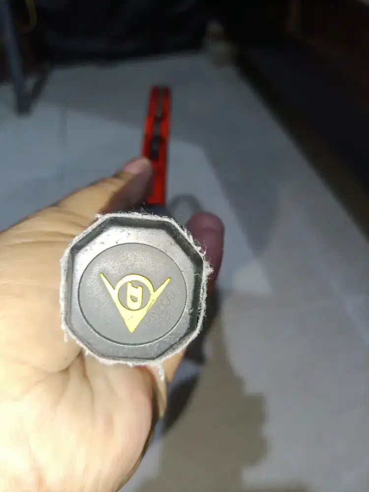 Raket tennis merk Dunlop for junior